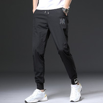 Summer new ice-wire casual pants male Korean version Chaoters Sports pants 100 lap loose ultra slim big code bunches 90% pants