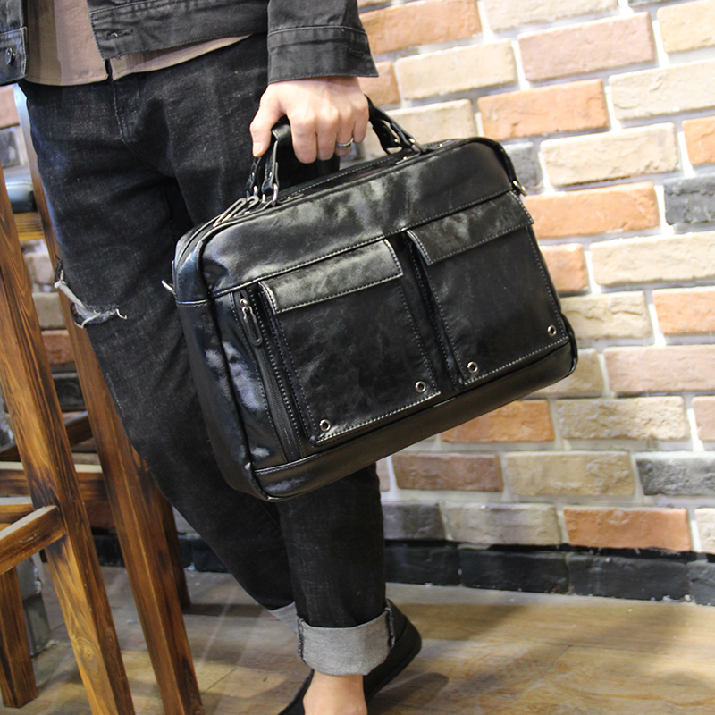 Hong Kong I Tgreg men's bag briefcase leather business bag handbag single shoulder messenger bag Korean version of the trend backpack