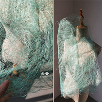 Re-engraved mint green withered vine three-dimensional heavy texture irregular folds creative grass and tree jacket clothing designer fabric