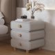 Bedside table Solid wood cream color bedroom bedside cabinet Simple modern leather three-pump three-layer small ultra-narrow storage cabinet