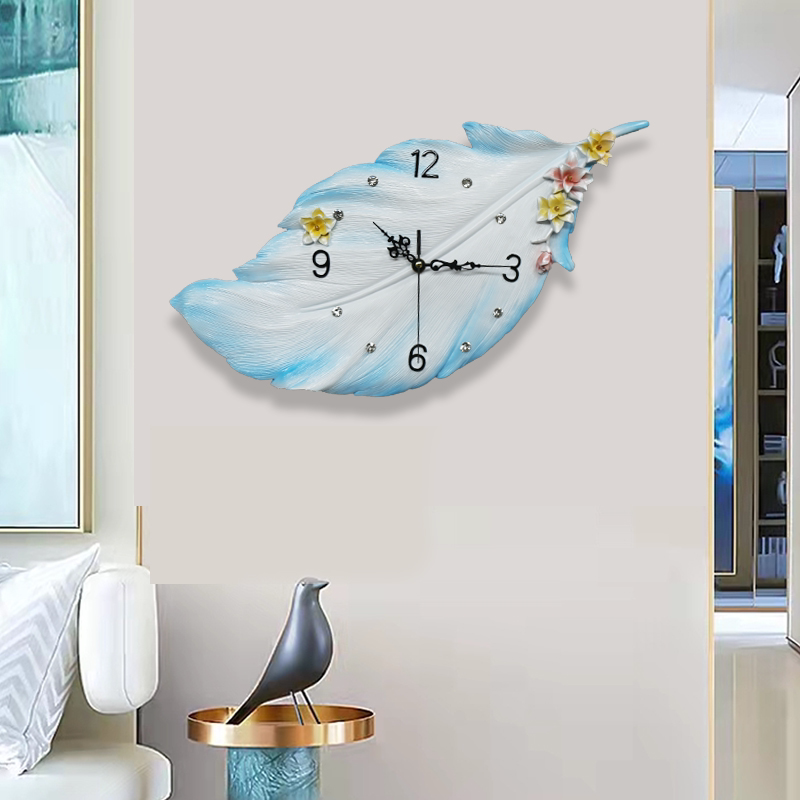 Simple creative modern feather clock silent clock network red personality household living room clock atmospheric wall clock