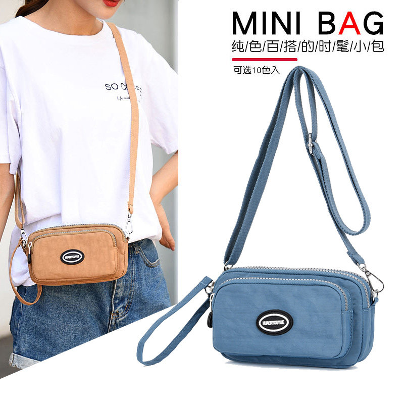 Mini net red small cloth bag casual shoulder messenger bag 2021 new simple mobile phone bag hand bag canvas bag women