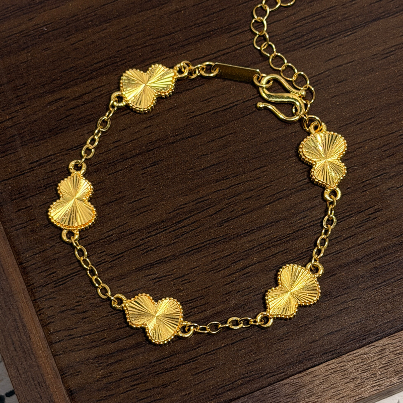 Gold-Plated Silver Laser-Engraved Five-Flower Gourd Bracelet, 9999 Gold, Versatile, Commuter-Friendly, Light Luxury, Popular Niche Jewelry for Women Gold-Plated Silver Laser-Engraved Five-Flower Gourd Bracelet, 9999 Gold, Versatile, Commuter-Friendly, Light Luxury, Popular Niche Jewelry for Women