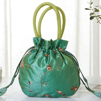 Светло-зеленая сумочка