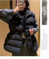 Черный жилет без рукавов