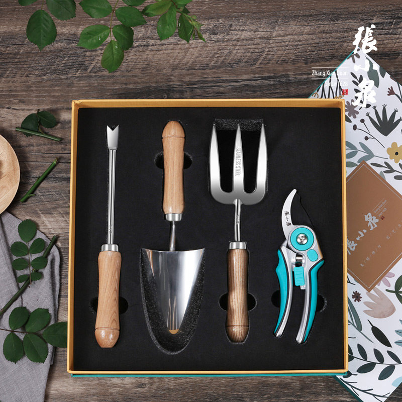 Zhang Xiaoquan family gardening tool set planting flowers four-piece set small iron shovel shovel outdoor digging soil to grow flowers