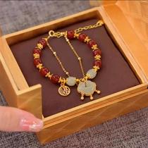 The natural red agate round beads in the zodiac year are matched with the s925 Fu brand silver small lock accessories to design elegant and fashionable men.