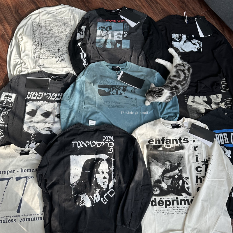 Now T0 Series Erd (Ergonomic Research and Development) Is Releasing a Distressed and Destroyed Portrait Poster Slogan Print Boxy Long Sleeve
