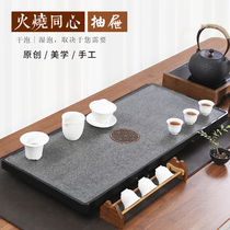 Natural black gold stone tea tray hand-polished stone dry bubble living room tea table Household living room drawer water storage simple