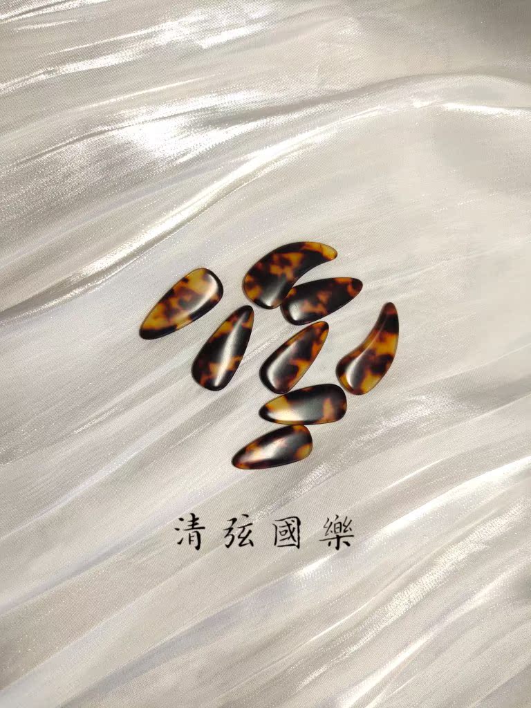 Ancient red material guzheng nail beginner beginner soft acetate double face arc with clear strings national music