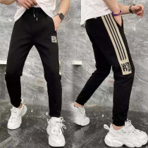 Yixin shop early autumn mens trousers stitching knitted striped letter High-elastic small foot pants slim sports casual pants