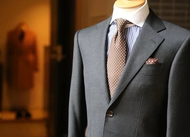 The men's suits are custom made