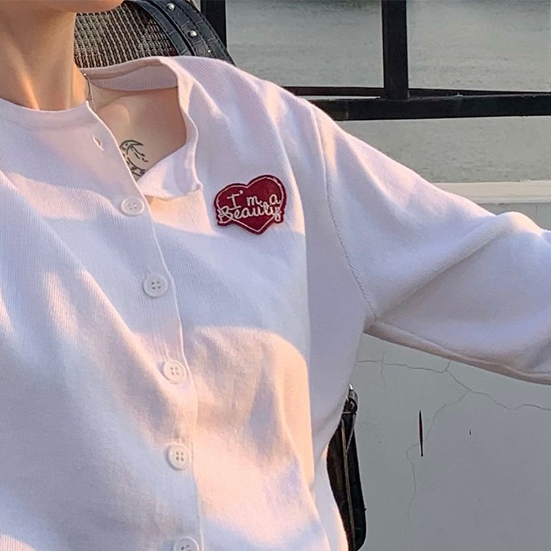 White knitted cardigan coat women's early spring 2021 new Korean version of the slim long-sleeved short thin top women's tide