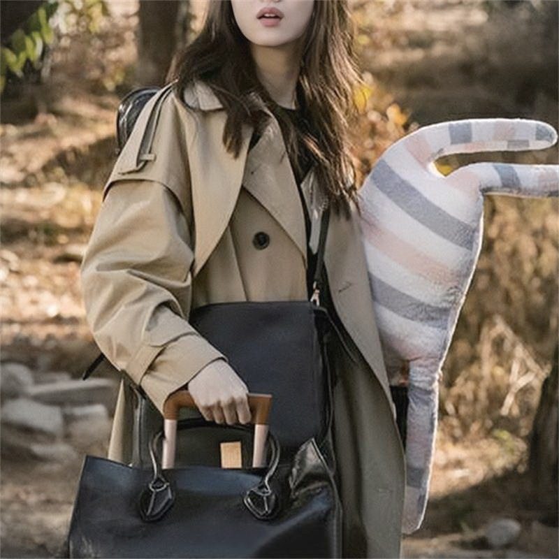 2022 spring and autumn new star Pei Xiuzhi same style trench coat women's mid-length British style loose waist over-knee coat