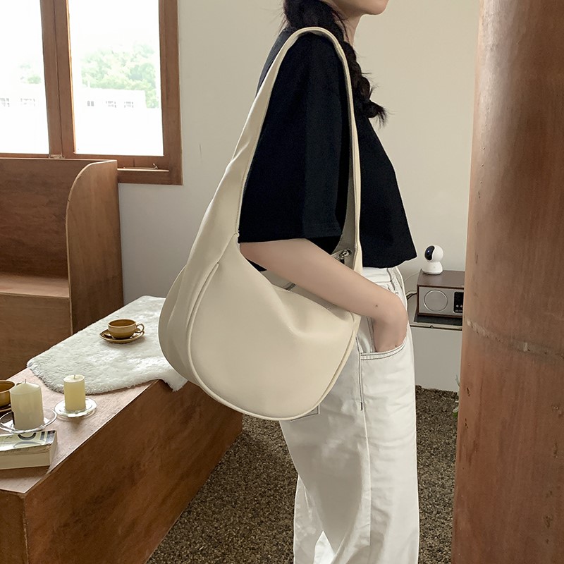 Wide shoulder strap dumpling bag female small bag messenger bag simple atmosphere cute Mori cool classic retro style single shoulder