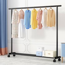 A rack for drying clothes a bar for drying clothes a steel pipe floor hanger a shoe rack a clothes rack one of the accessories simple