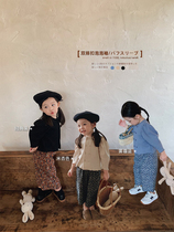 Girls double-row buckle with bubble sleeves small shirt 2022 fall Korean version pure color new foreign air ladies temperament womens blouse