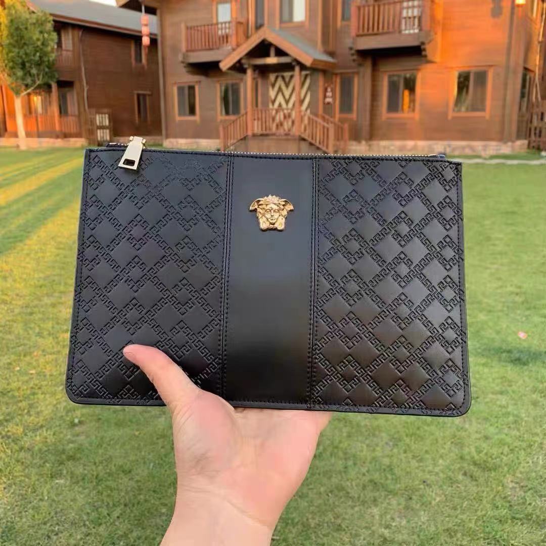 Light luxury Fanjia's new leather men's handbag with envelope bag head layer cowhide youth clutch bag trendy