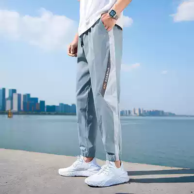 Pants men's trend brand Korean version of the trend 2021 spring thin nine-point ice silk sports tie-foot tooling casual trousers