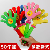 Cheer clapping hand clapper with small hand slapping a small bassist small night light glowing and smiling cheering on the hand and clapping the palm of the hand