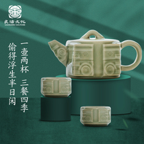 Liangzhu Culture One Pot of two cups jade Cong decorated with green porcelain tea set Courtesy Kit Museum Ventron Tea Cup accompanied by hand