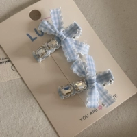 Синий клетчатый ромбовидный узел из одного слова