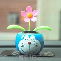 Car ecstasy decorated with solar pendulum sun flower pendulum cute paparazzi in the car Nu Bibi shakes the leaves