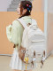 Large-capacity burden-reducing spine-protecting school bag for female primary school students, middle school students, junior high school students, high school students and college students new backpacks