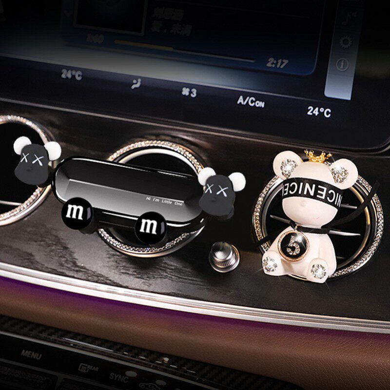 Car mobile phone holder mobile phone holder multi-function air outlet gravity snap-on cartoon car interior navigation frame