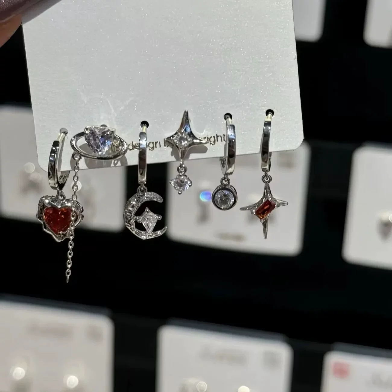 Set with zircon, small design earrings