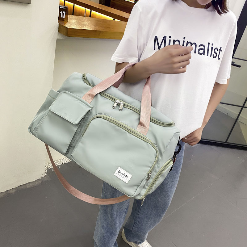 Travel bag women's hand-held large-capacity men's waterproof light waiting for delivery storage short-distance travel bag student luggage bag