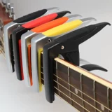 Гитара, металлическое укулеле с партитурой с аксессуарами