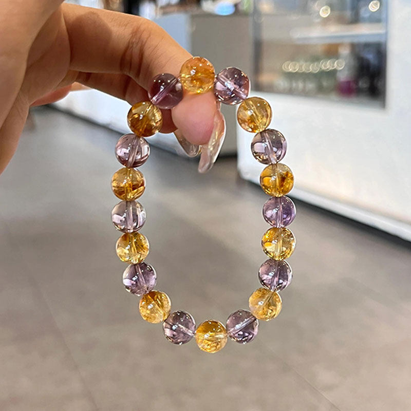 天然シトリンとアメジストを使用した女性用ブレスレット。アメジストとクリスタルの組み合わせが特徴で、ニッチで控えめなラグジュアリースタイルです。
