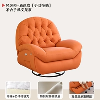 Легкая роскошная апельсиновая кошка захват кожу [сидит вручную]