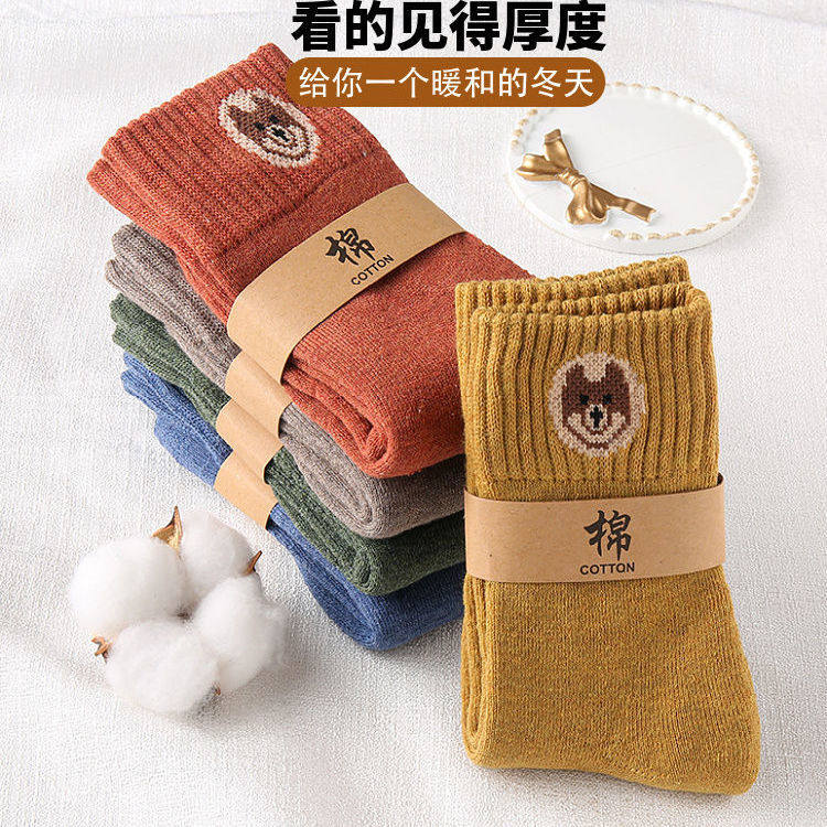 Zhejiang Zhuji City socks socks women's autumn and winter models thickened and velvet solid color Korean version of the tube socks ins winter protection