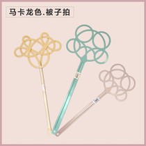 Plastic dusting duster cotton quilted with a beat and a pat on the back of the duster and dusted with a pat on the back and a duvet.