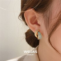 Fan-style small crowdsourced earrings senior feel luxurious and suitable for round face Korean temperament Net Red 2021 The new wave womens light extravaganza