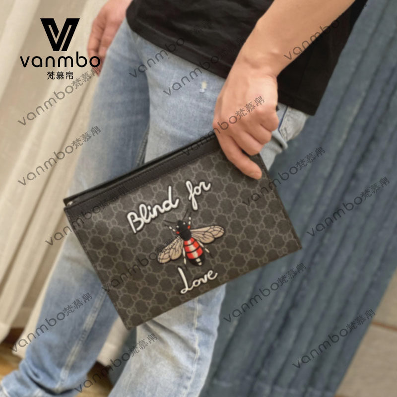 2022 new men's handbags embroidery individuality hand grab bag casual big card headlayer Bull Leather Hand Grip Tide Card Envelope bag