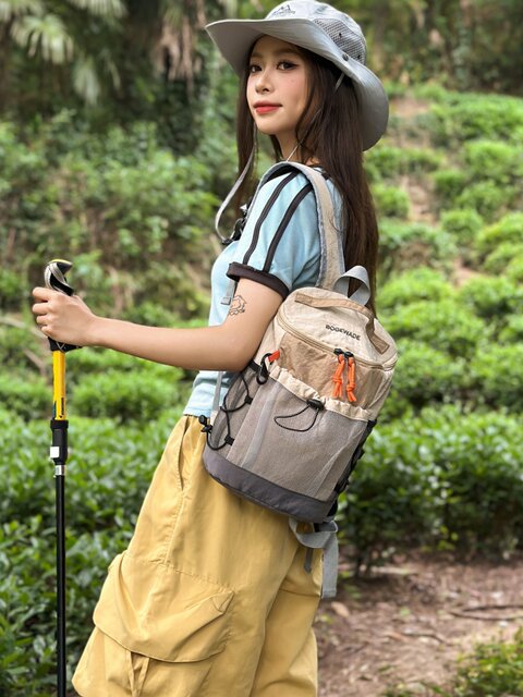 Outdoor travel backpack, large-capacity hiking and mountaineering bag, light travel storage, small school bag, leisure cycling backpack