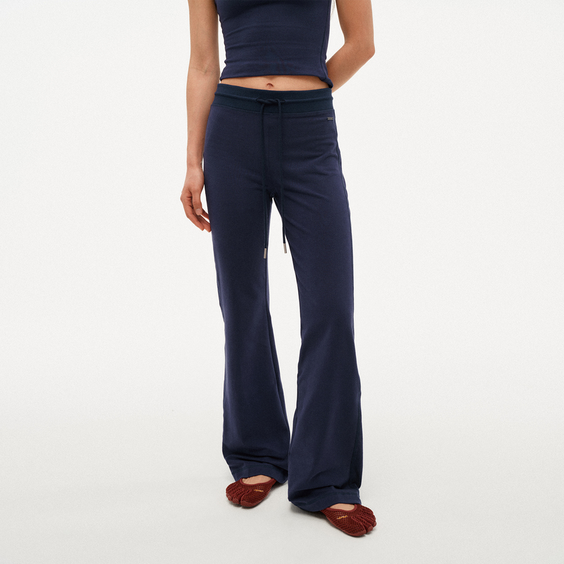 Swing Day Slim-Fit Pants That Make Legs Look Longer | Cotton Stretch Flared Pants with Metal Logo