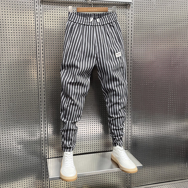 ກາງເກງບາງໆໃນລະດູຮ້ອນ ແລະ ຜ້າປ່ານເສັ້ນແນວຕັ້ງ ໂສ້ງກະໂປງສີກາກີຂອງຜູ້ຊາຍ ເກົ້າຈຸດ trendy Korean style Slim-fitting harem pants