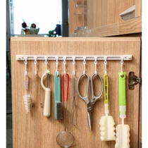 A row of hooks on the back of the cabinet door a sliding track no need to punch holes a hanging rod artifact a spoon a shovel a kitchen utensil storage rack