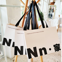 Customized internet celebrity shoulder handbag clothing store shopping paper bag packaging clothes bag hand pocket customization