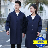 Густой темно -синий пальто