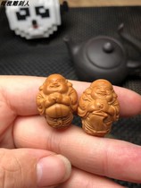 Olive stone carving a pair of single-grain pendants Maitreya the God of Wealth red oil stone old material