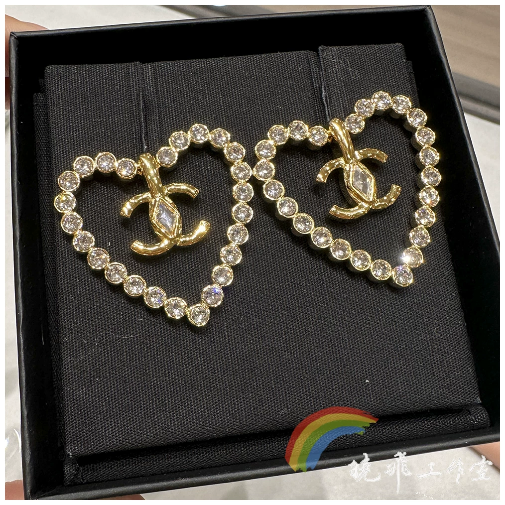 Покупка серьги CHANELChanel с золотистыми стразами на грани любви двойная буква C серьги