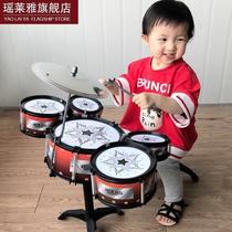 Toy drum children banging on drums to practice baby girl music children Play in a drummer for young children