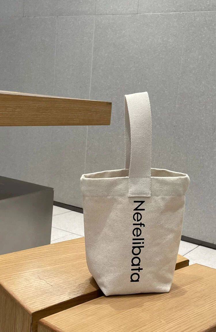 Мода холст 杯袋奶茶袋帆布手提包袋小包水桶包化妆包可携式外出随身遛弯拎袋