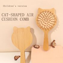 Mini portable wooden comb cat air cushion airbag massage com