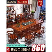 High-end new Chinese style large board tea table and chair combination log solid wood tea table modern household one table five chairs Zen coffee table